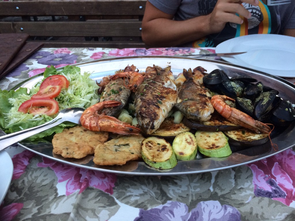 Grilled fish plate, Bosnian version. This one comes with veggies and potato cakes.
