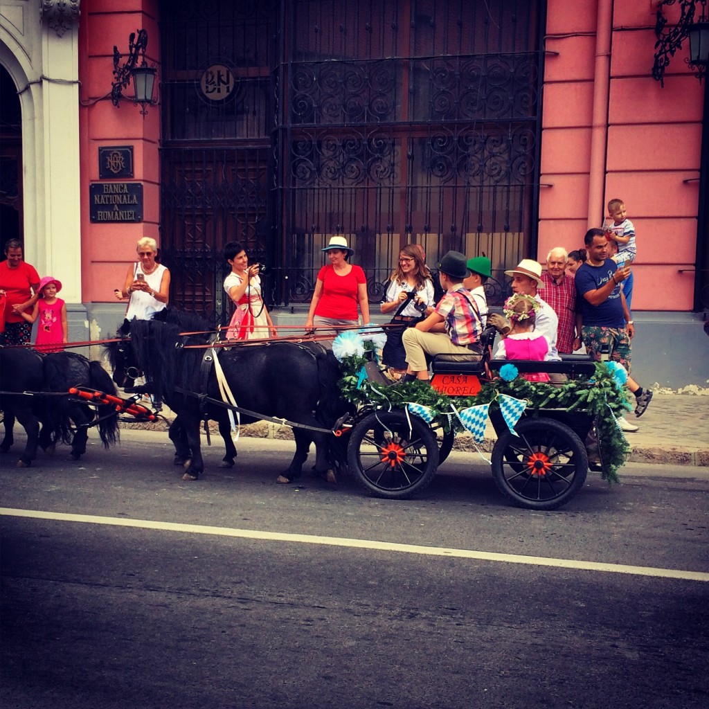 Romanian Oktoberfest included the obligatory parade. Complete with a kiddie float. Too cute.